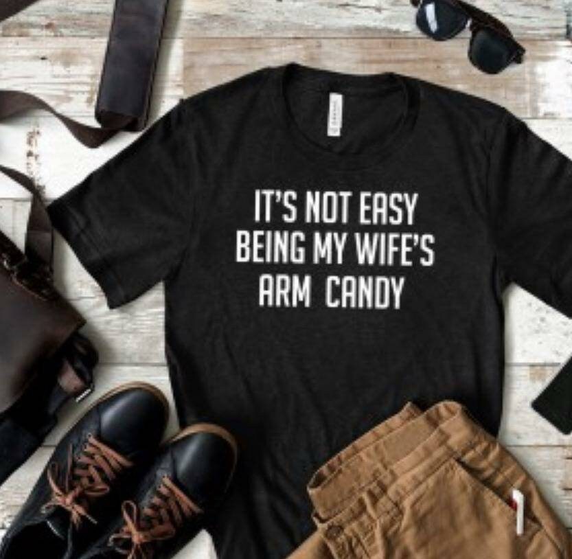 Funny Husband Shirt: It's Not Easy Being My Wife's Arm Candy