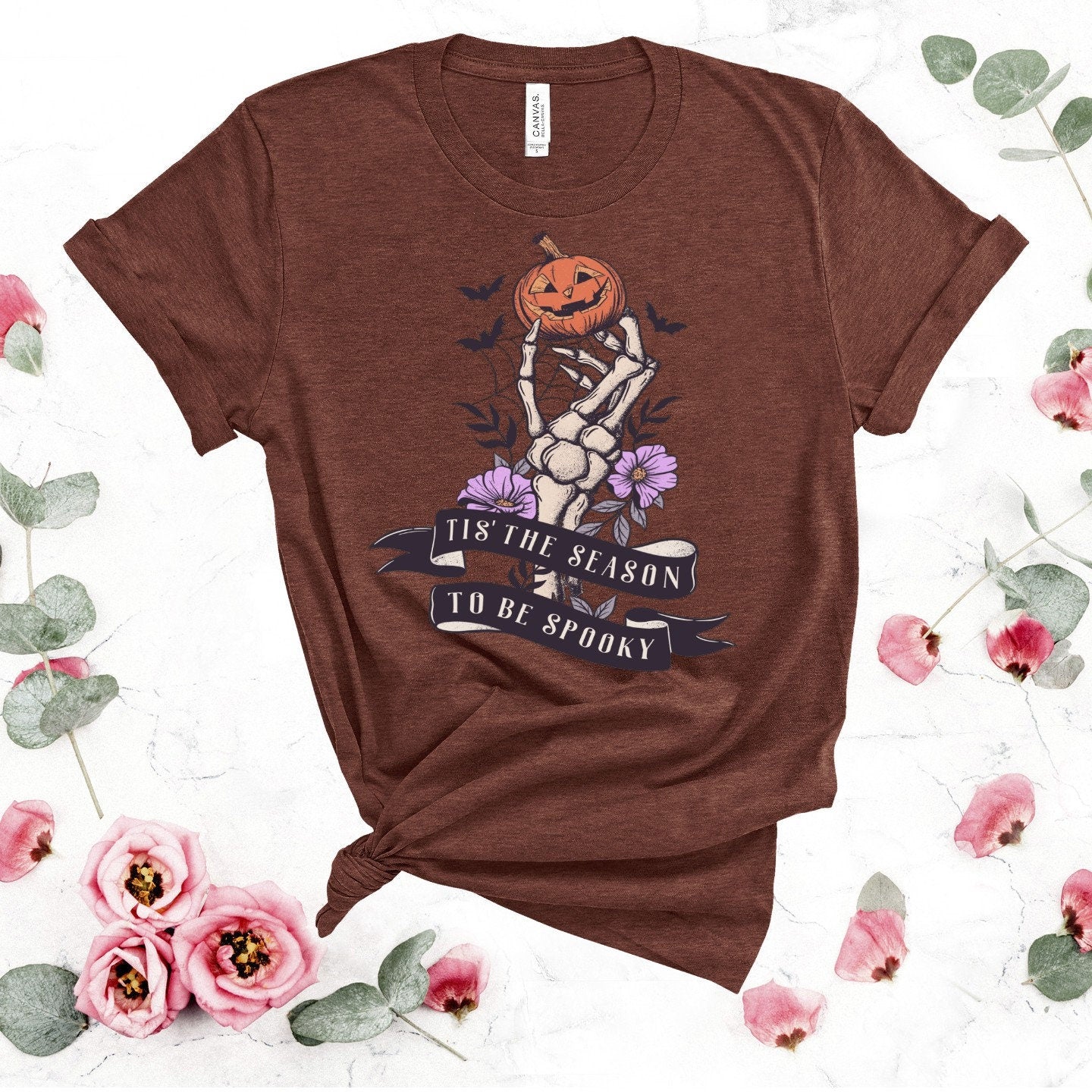Spooky Season T-Shirt: Skeleton Hand & Pumpkin Halloween Tee