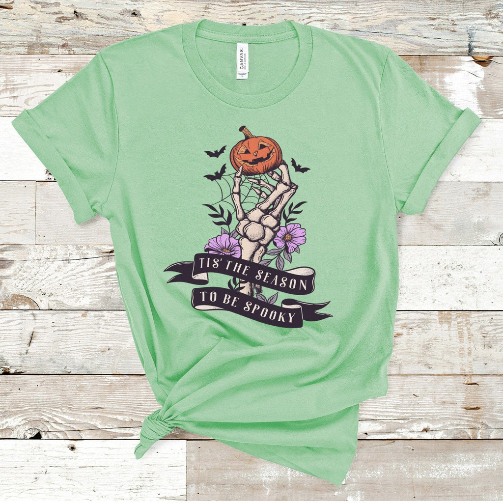 Spooky Season T-Shirt: Skeleton Hand & Pumpkin Halloween Tee
