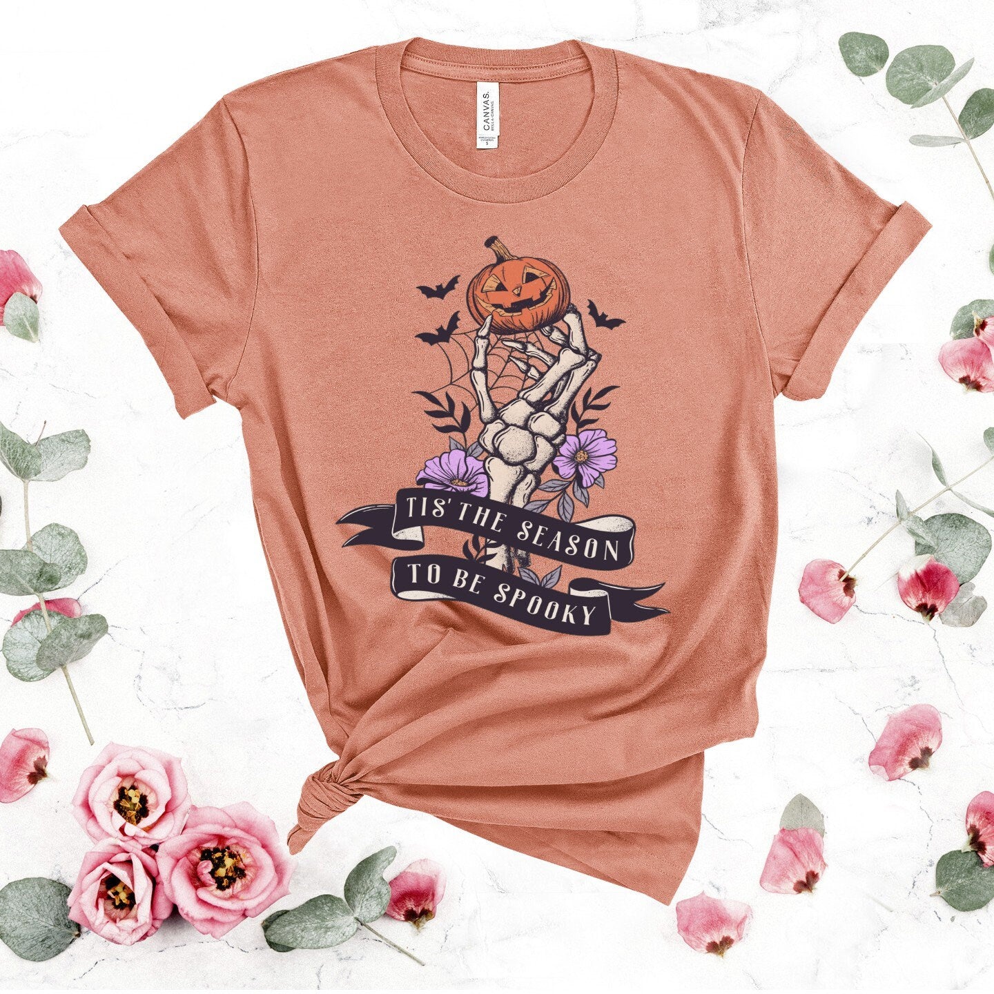 Spooky Season T-Shirt: Skeleton Hand & Pumpkin Halloween Tee